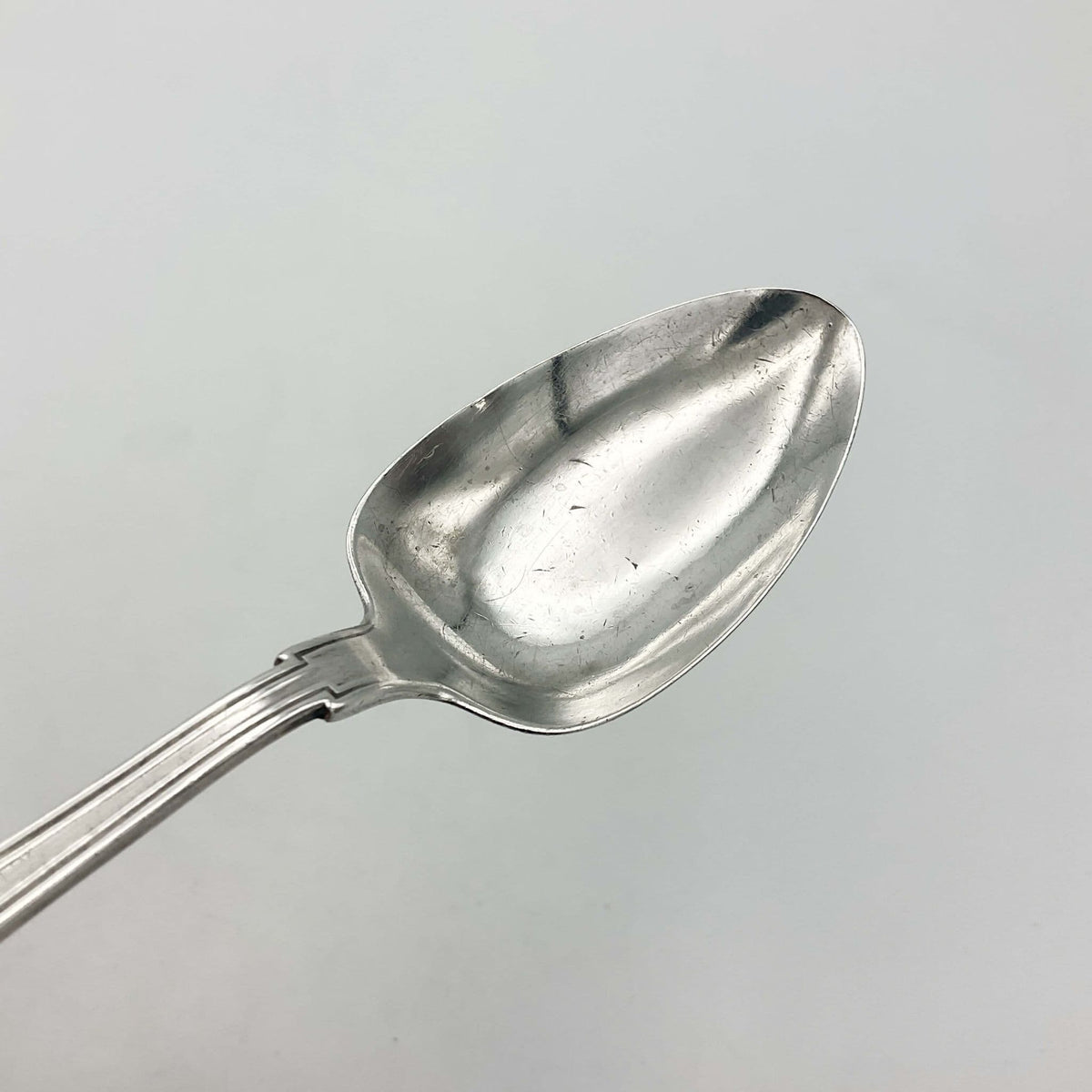 Antique small silver spoon and fork set by Beeches Vintage, perfect for christening gifts, with intricate vintage detailing.