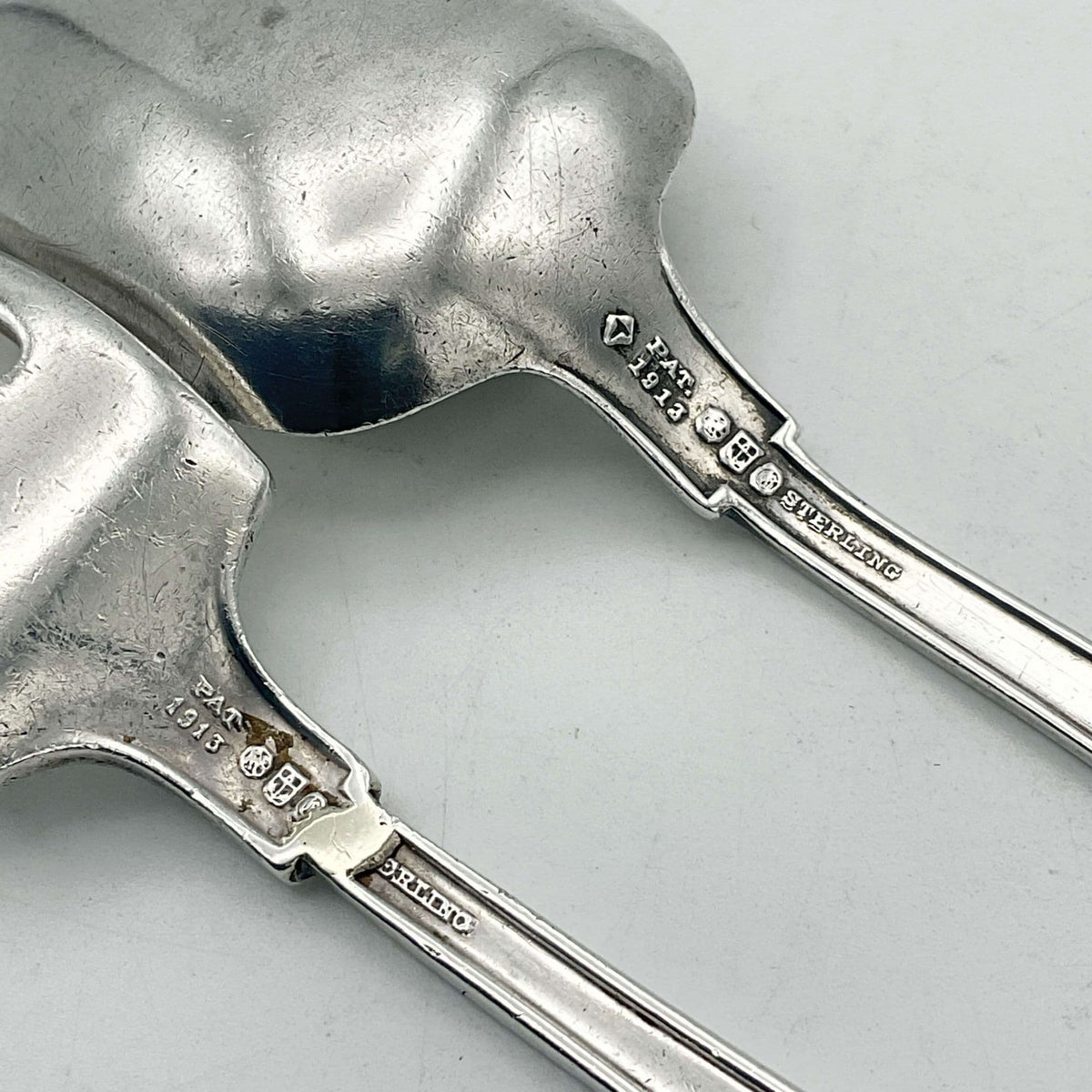 Antique small silver spoon and fork set by Beeches Vintage, perfect for christening gift, featuring intricate vintage design.