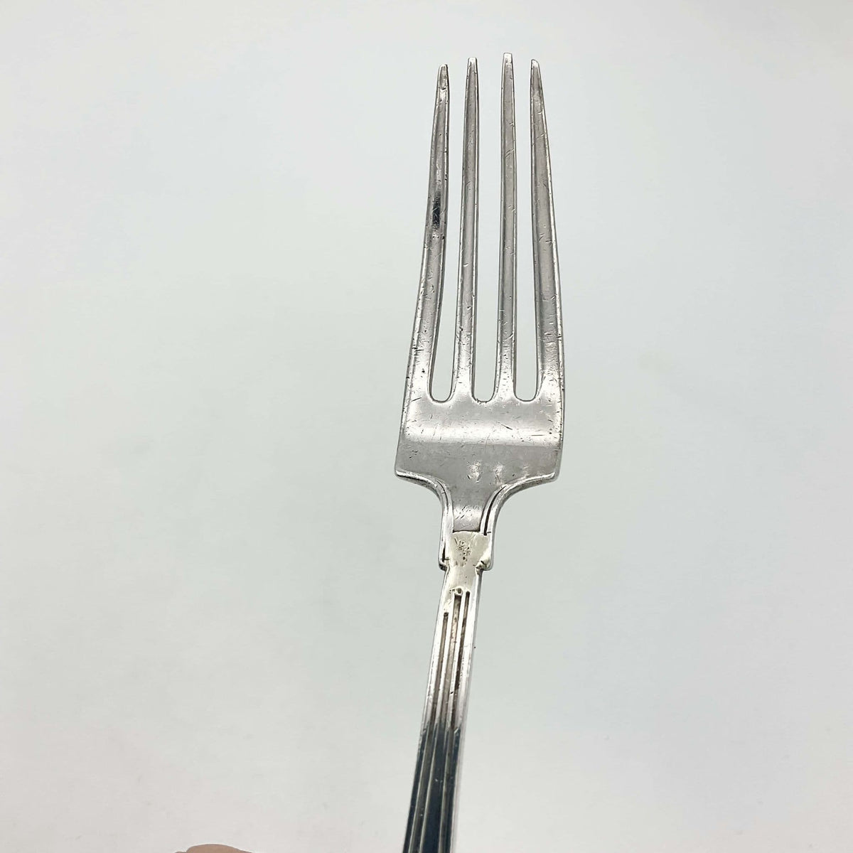 Antique small silver spoon and fork set by Beeches Vintage, perfect as a christening gift, featuring intricate vintage detailing.
