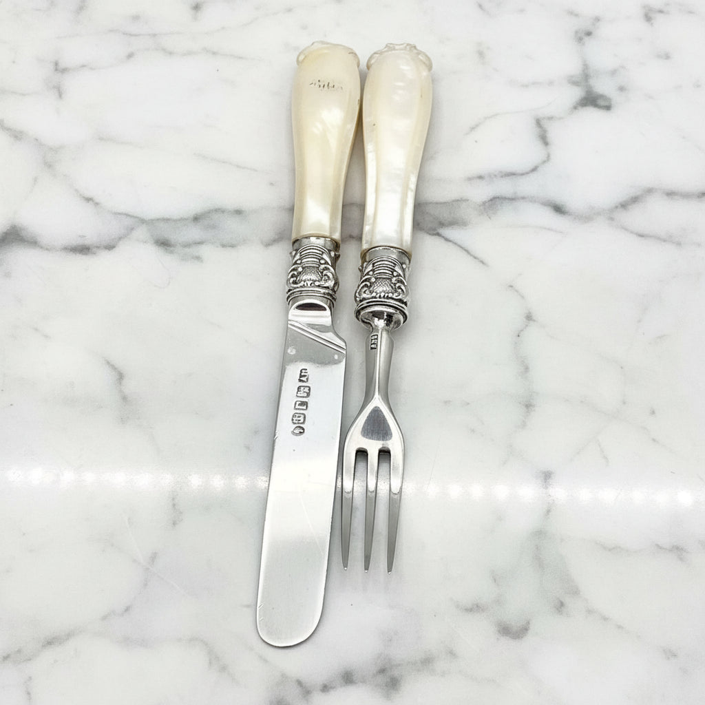 knife and fork on marble worktop