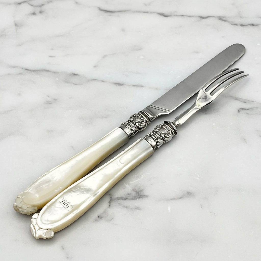 back of silver cultery on marble worktop