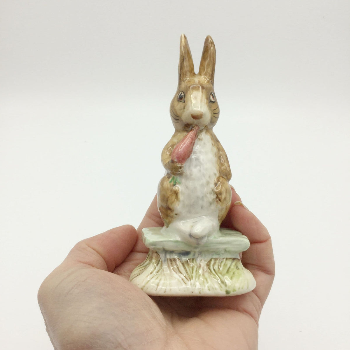 Beswick Beatrix Potter Fierce Bad Rabbit china figurine, detailed collectible ceramic rabbit with a fierce expression.