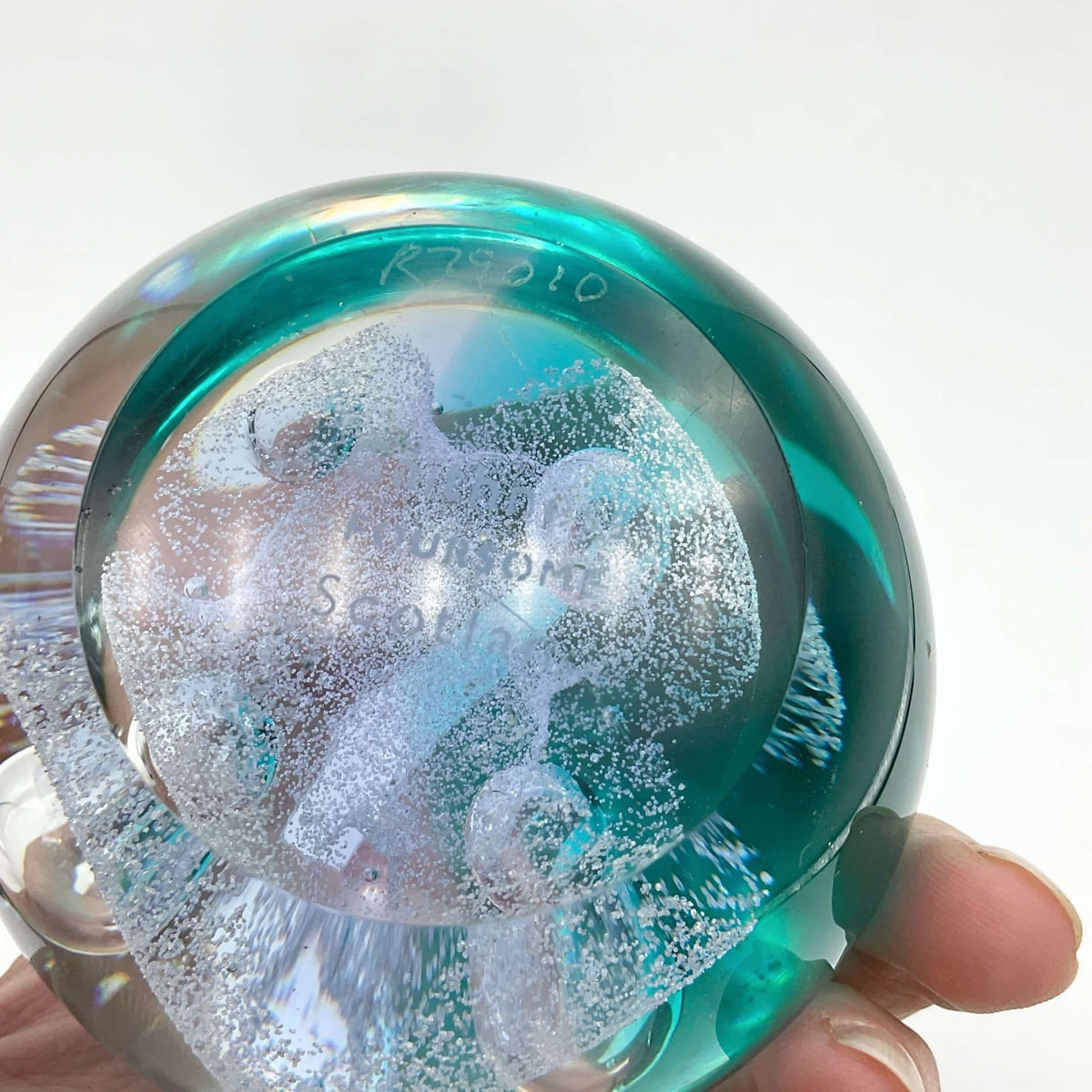 Caithness Glass Foursome Paperweight collectible featuring intricate glass design, displayed on a neutral background.