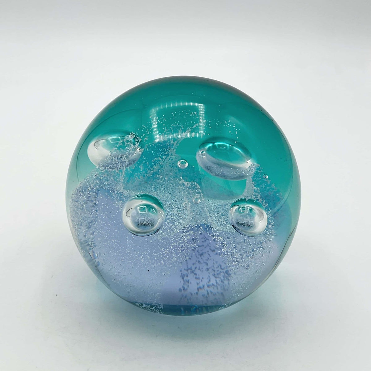 Caithness Glass Foursome Paperweight, collectible glass artwork with intricate design, displayed on a neutral surface.