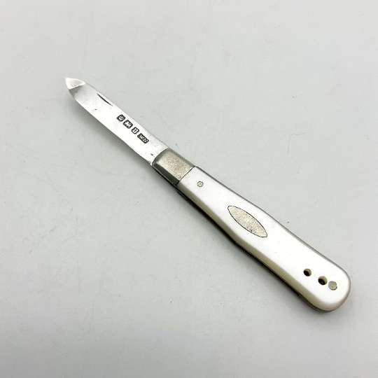 Antique Sterling Silver Fruit Knife with 1912 Hallmark from Beeches Vintage, detailed silver handle and blade for vintage tableware.