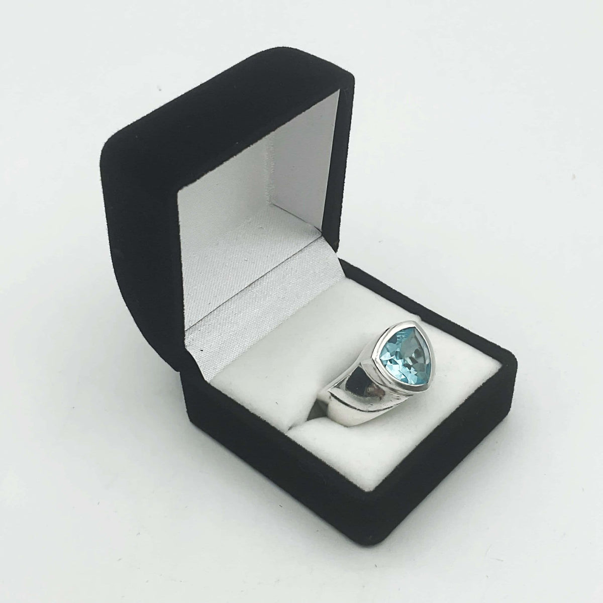 Light-blue topaz silver ring by Beeches Vintage featuring an aquamarine gemstone set in a detailed silver band.