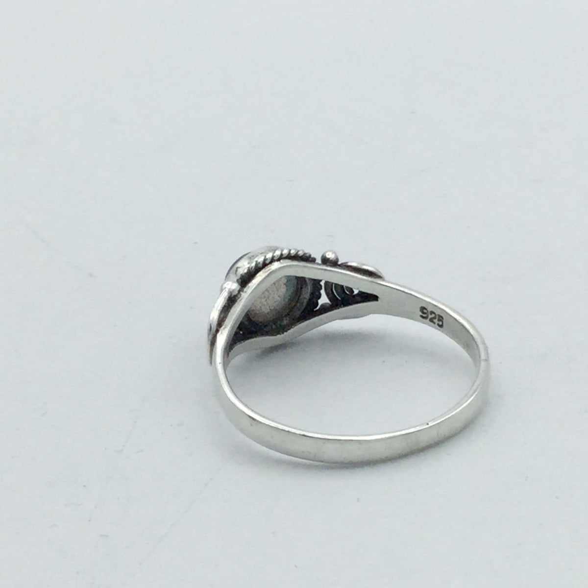Back view of moonstone silver ring with 925 stamped inside 