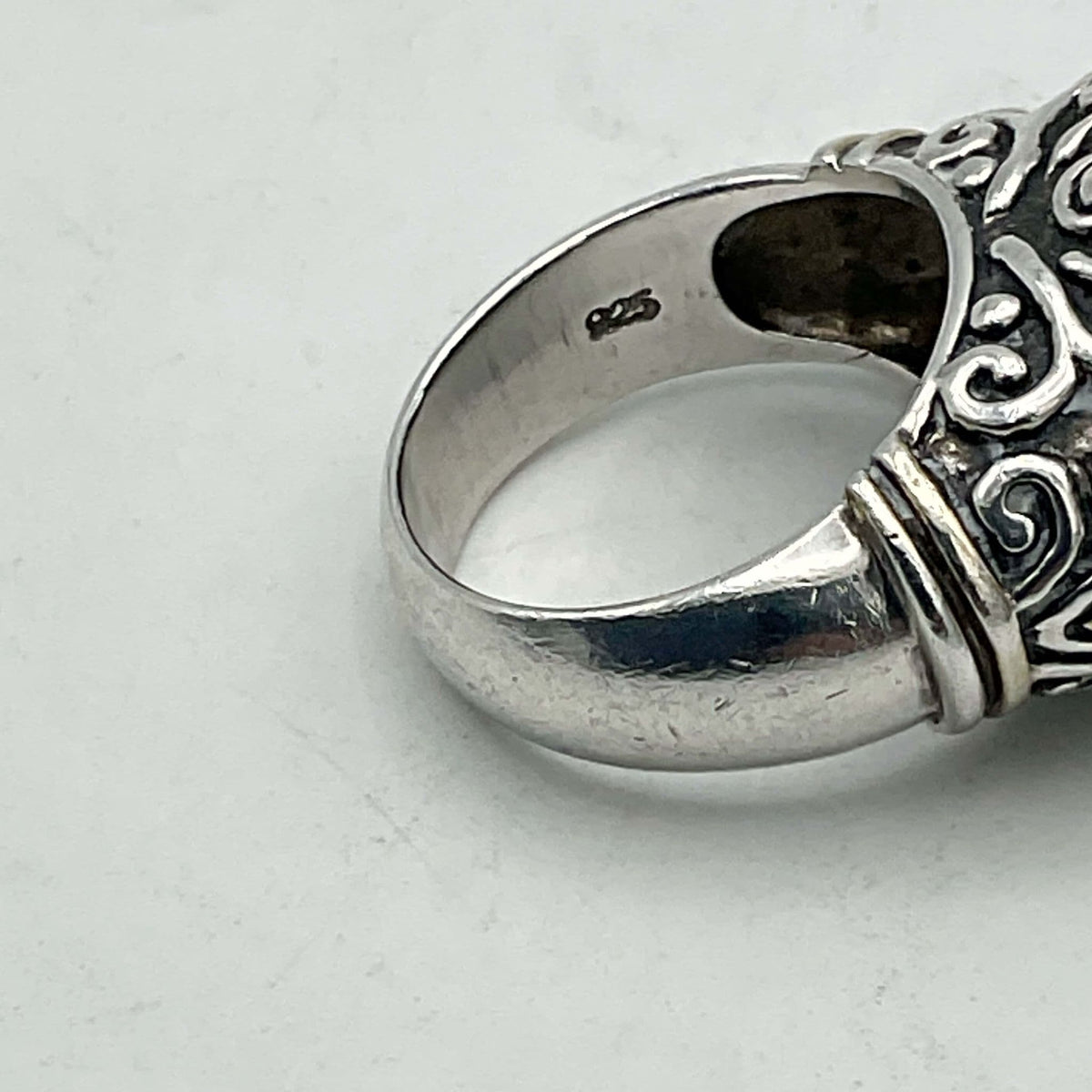 Oval black onyx silver ring by Beeches Vintage featuring a polished black onyx stone set in a sleek silver band.