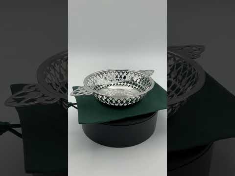 video short of antique silver bowl