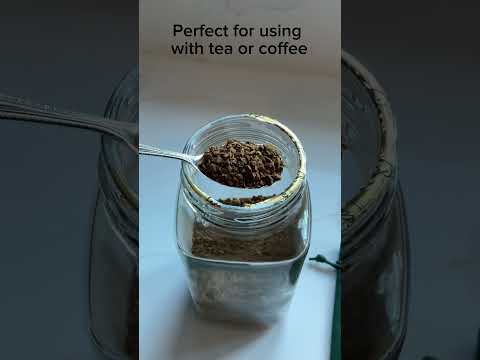 video short of tea caddy spoon being used with coffee granules