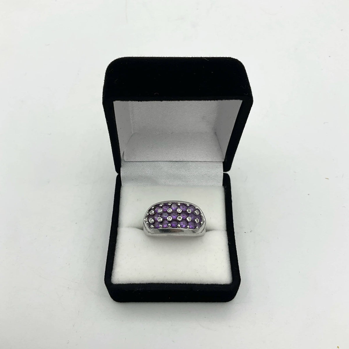 Purple Amethyst sterling silver ring with a detailed band, showcasing a vibrant purple gemstone set in a Beeches Vintage design.