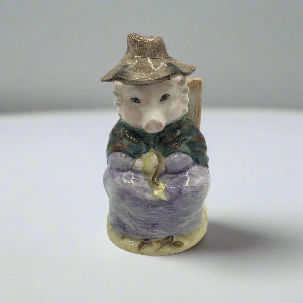 pig figurine on a white table