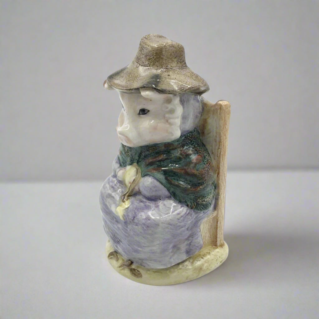 pig figurine on a white table