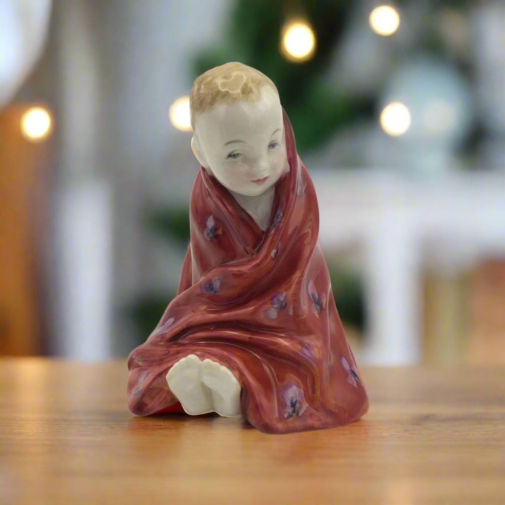 ornament on a table with decorations in the background
