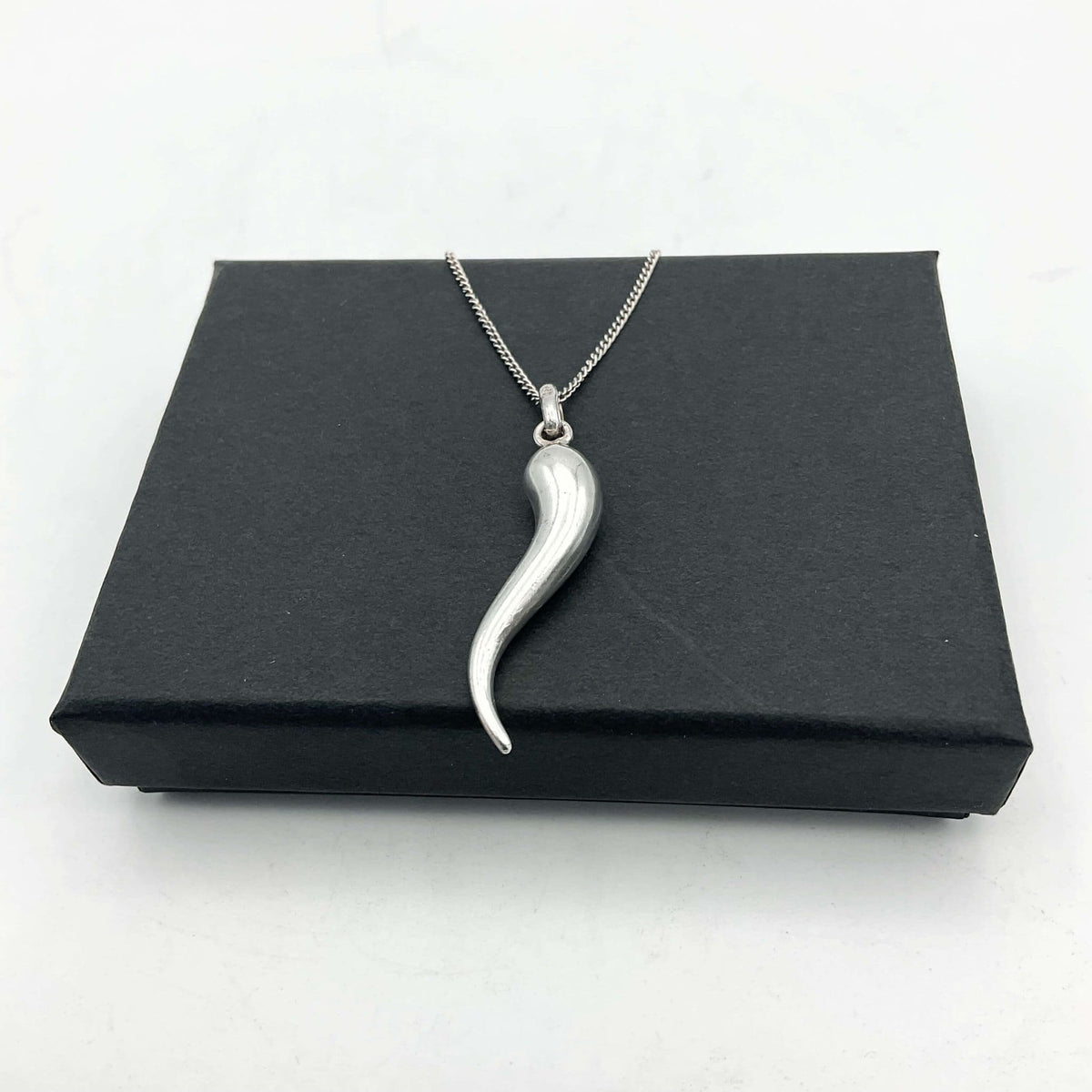 Silver drop pendant necklace from Beeches Vintage featuring a sleek, elegant design with a polished silver finish.