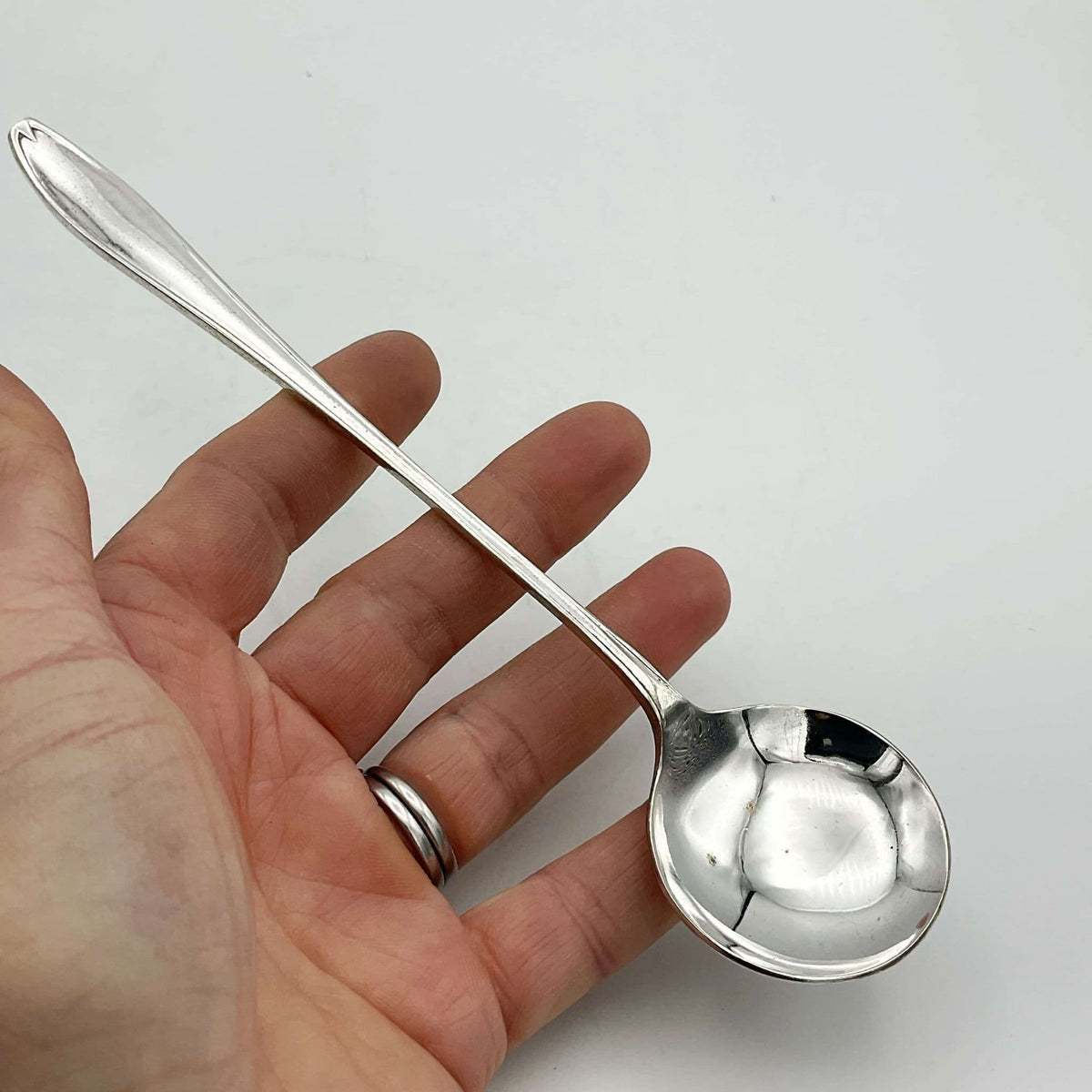 Set of four silver-plated long-handled dessert spoons by Beeches Vintage, showcasing elegant vintage-style cutlery.