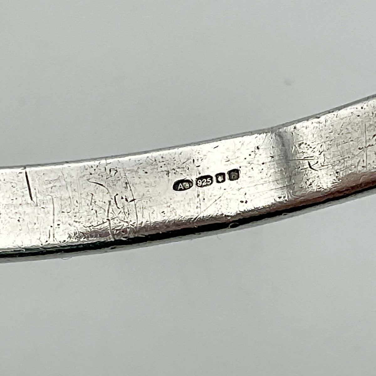 Solid sterling silver bangle bracelet from Beeches Vintage, showcasing a smooth, polished design with a sleek, contemporary look.