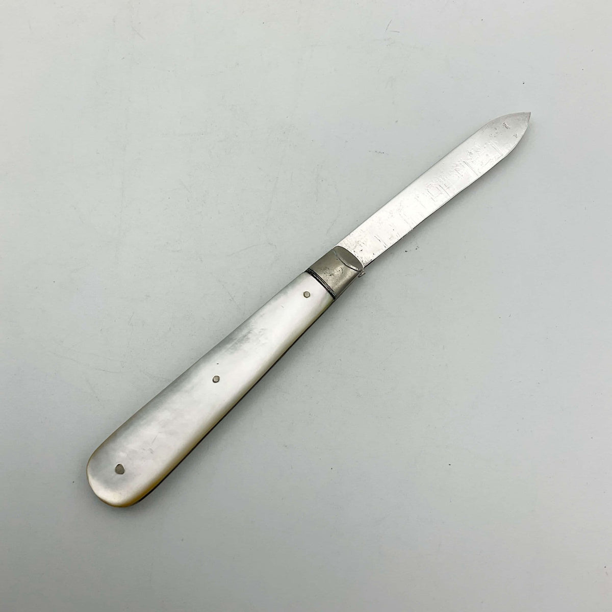 Vintage 1926 Sterling Silver Fruit Knife by Beeches Vintage with a mother-of-pearl handle and antique hallmark feature.