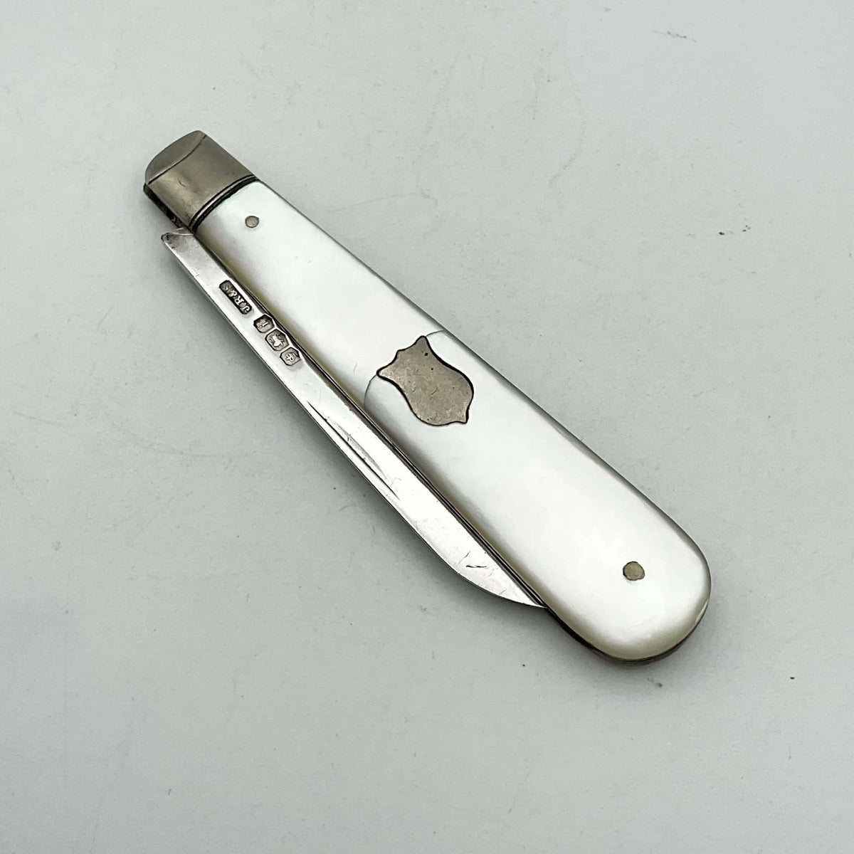 Antique Sterling Silver Beeches Vintage Fruit Knife with a mother-of-pearl handle and 1926 hallmark.