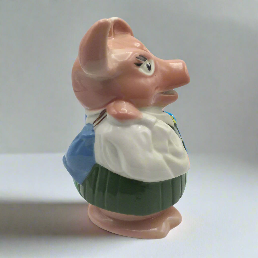 Annabel piggy bank on a white table