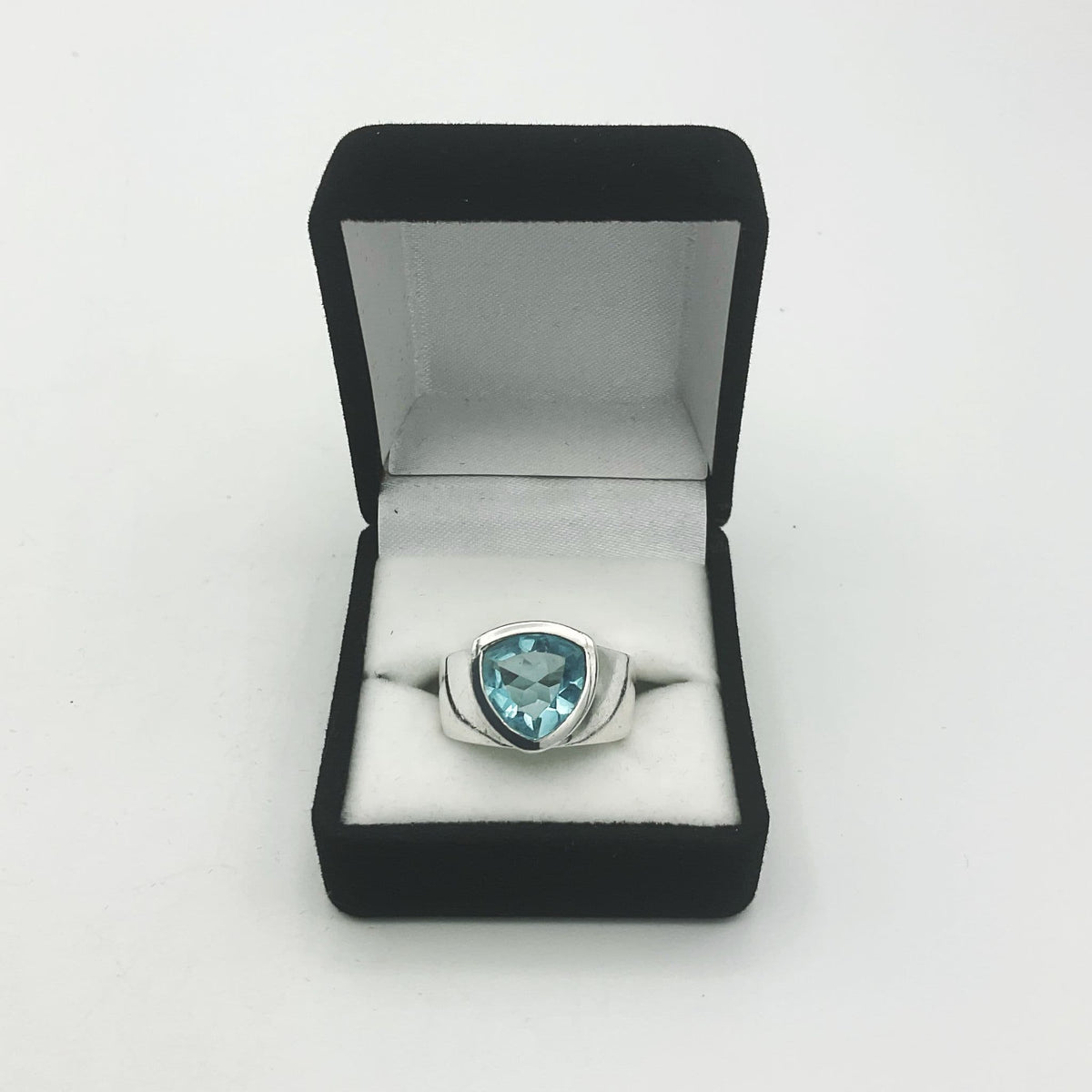 Light blue topaz Aquamarine silver ring by Beeches Vintage featuring a polished band and intricate design details.