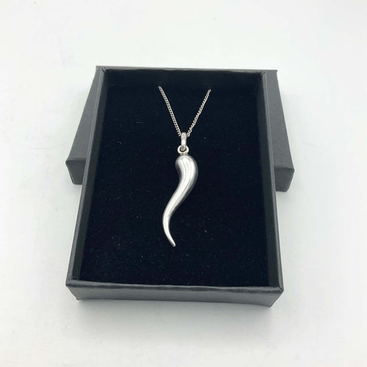 Silver drop pendant necklace by Beeches Vintage featuring a sleek, elegant silver pendant on a delicate chain.