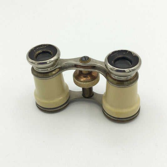 vintage ivorine opera glasses on a white background